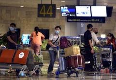 <b>无极4平台代理新加坡要求部分入境者佩戴电子追</b>