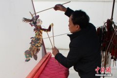 无极荣谈代理（新春见闻）中国皮影戏40载“守”